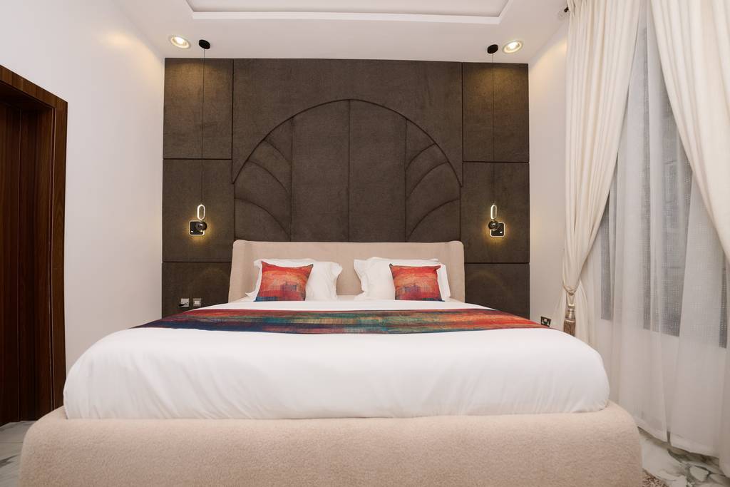 Executive Lodge living room with king-size bed